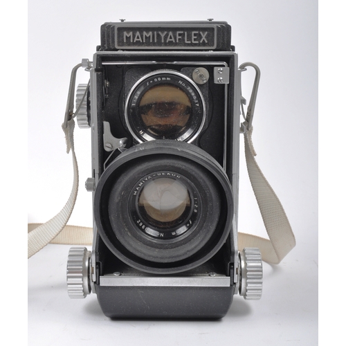 261 - Two Mamiyaflex twin lens reflex medium format cameras. One body with fitted f = 80mm 1 : 2.8 lens, t... 