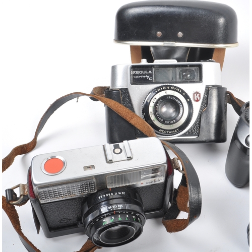 265 - A collection of vintage SLR 35mm film cameras. Models are: Minolta Dynax 9xi - Lens 28-90mm f.4-5.6 ... 