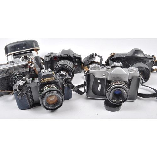 265 - A collection of vintage SLR 35mm film cameras. Models are: Minolta Dynax 9xi - Lens 28-90mm f.4-5.6 ... 