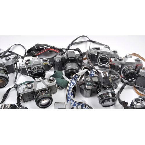 273 - A collection of 15 x vintage SLR cameras. Models are: Praktica MTL5B - lens Vivitar 28-70mm f3.5-4.8... 