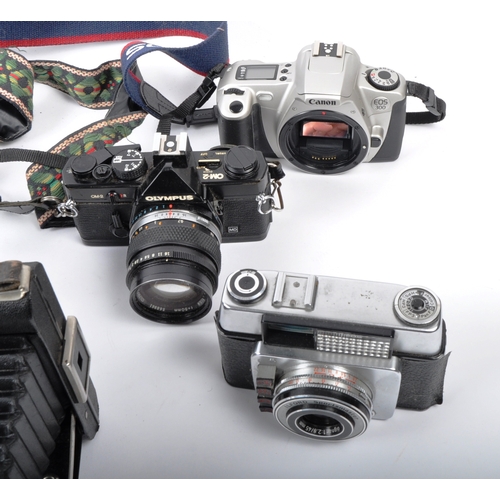 289 - A mixed collection of 12 x vintage film cameras. Models are: Kodak Brownie Six-20 (folding), Fujica ... 