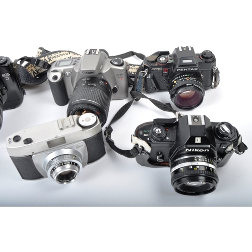 295 - A mixed collection of 10 x vintage cameras. Models are: Ricoh KR-10 - lens 50mm f2, Pentax Asahi - l... 