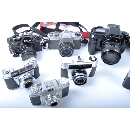 295 - A mixed collection of 10 x vintage cameras. Models are: Ricoh KR-10 - lens 50mm f2, Pentax Asahi - l... 