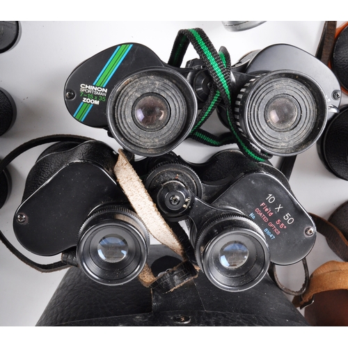 303 - A mixed collection of vintage binoculars. Models are: Hanimex Korea 8 x 40 (cased), Tecnar by Swift ... 