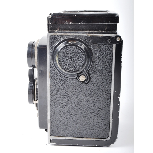 305 - A Rolleicord Twin Lens Reflex roll film camera, stamped Franke & Heidecke Braunschweig - D.R.P. Fitt... 