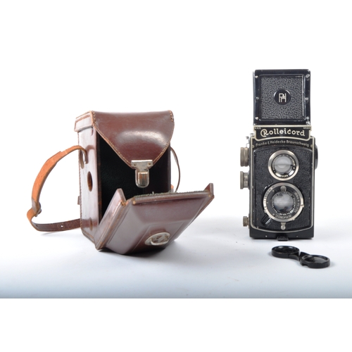 305 - A Rolleicord Twin Lens Reflex roll film camera, stamped Franke & Heidecke Braunschweig - D.R.P. Fitt... 