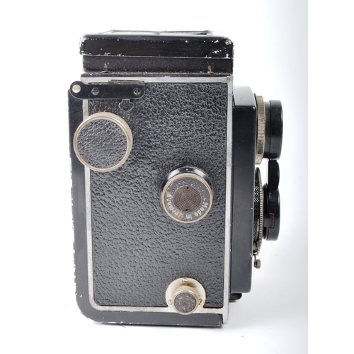 305 - A Rolleicord Twin Lens Reflex roll film camera, stamped Franke & Heidecke Braunschweig - D.R.P. Fitt... 