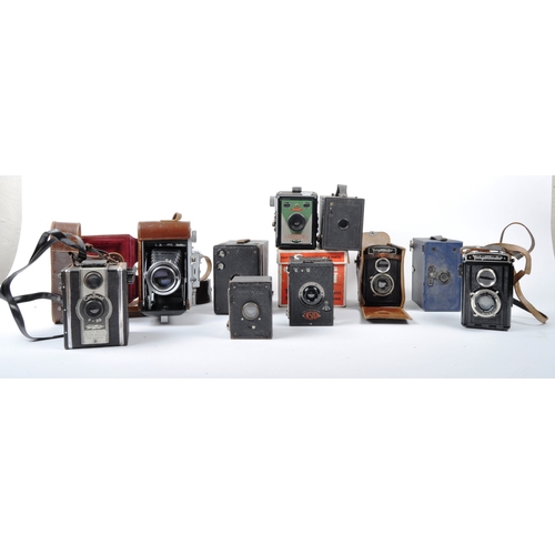 307 - A mixed collection of vintage cameras. Models are: 2 x Voigltlander Brillant - lens 7.5cm f 3.5 (bla... 