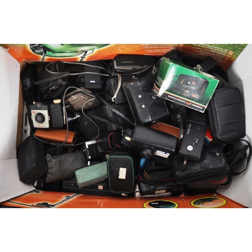 313 - A large collection of compact cameras. Approximately 40 compact film cameras. Models to include: Oly... 