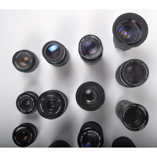 317 - A collection of camera lenses. Models are: Yashica 50mm f2, Cannon EF 28-80mm f3.5-5.6, Praktica Pen... 