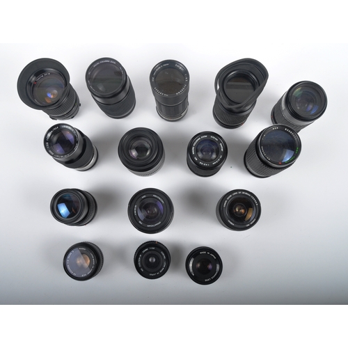 317 - A collection of camera lenses. Models are: Yashica 50mm f2, Cannon EF 28-80mm f3.5-5.6, Praktica Pen... 