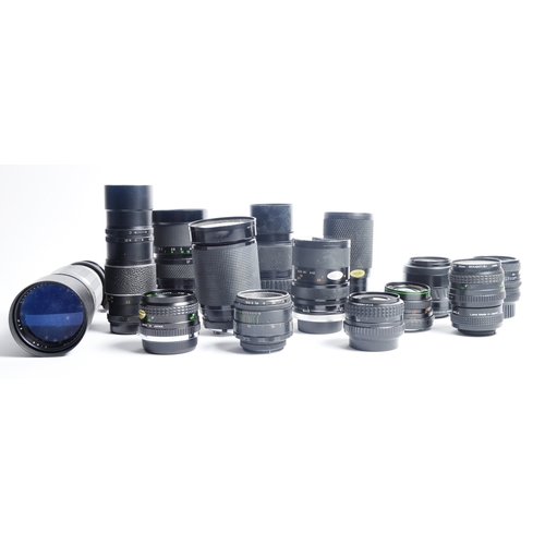 321 - A mixed collection of 14 x camera lenses. Models are: Soligor 400mm f 6.3, Super Danubia 37-105mm f3... 