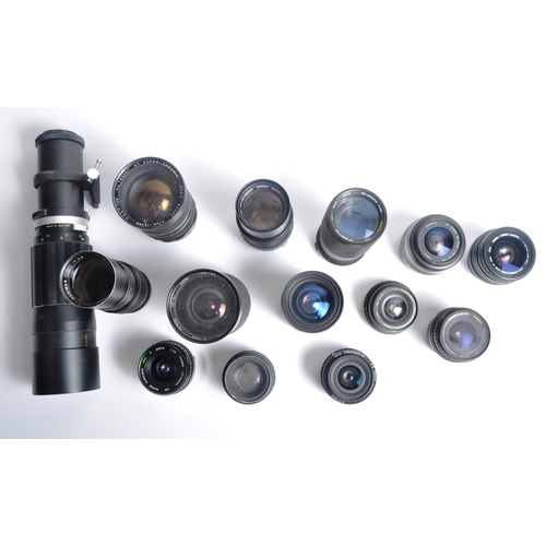 321 - A mixed collection of 14 x camera lenses. Models are: Soligor 400mm f 6.3, Super Danubia 37-105mm f3... 