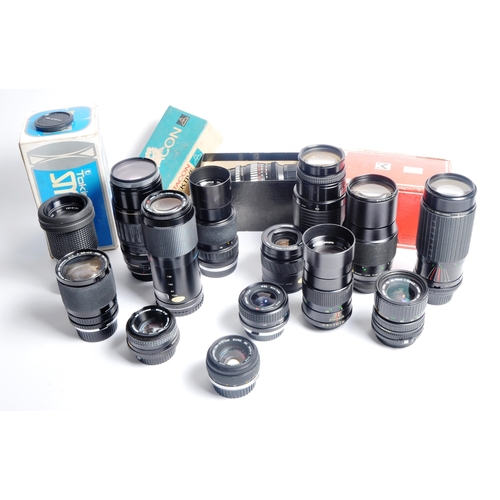 323 - A mixed collection of 14 x camera lenses. Models are: Sigma AF-1 75-300mm f4.5-5.6, Pentacon 135mm f... 