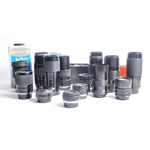 323 - A mixed collection of 14 x camera lenses. Models are: Sigma AF-1 75-300mm f4.5-5.6, Pentacon 135mm f... 