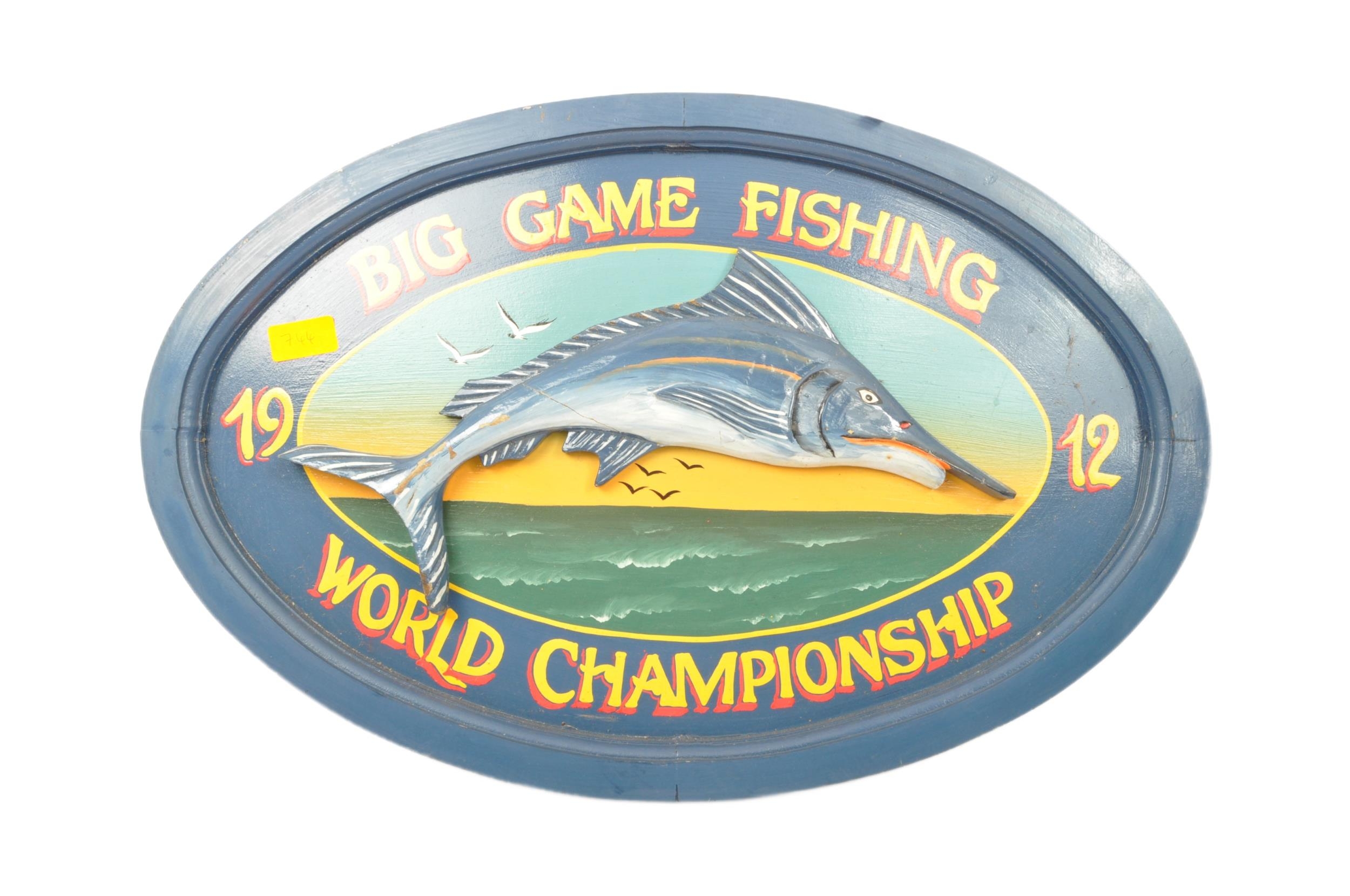 A vintage 20th century 'Big Game Fishing / 1912 / World Championship' hand  painted wooden sign of ov