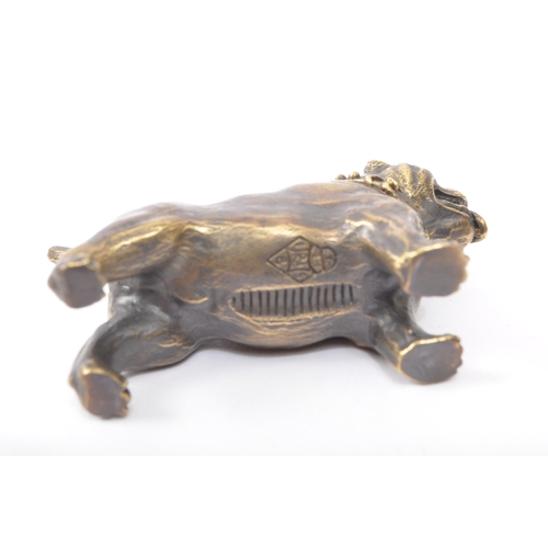 326 - A brass novelty vesta case in the form of a American Bulldog. The bulldog having a hinged opening to... 