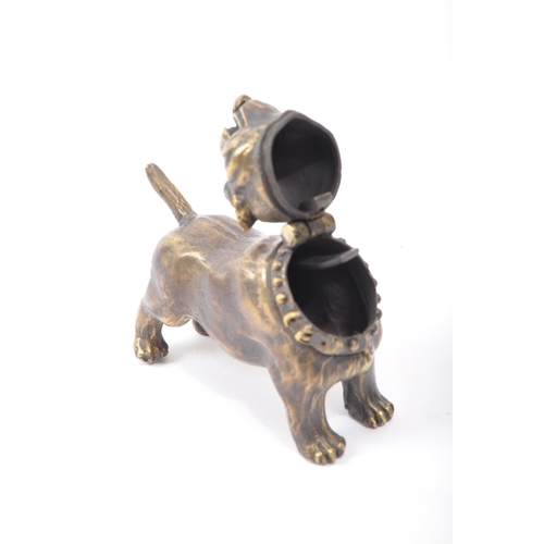 326 - A brass novelty vesta case in the form of a American Bulldog. The bulldog having a hinged opening to... 