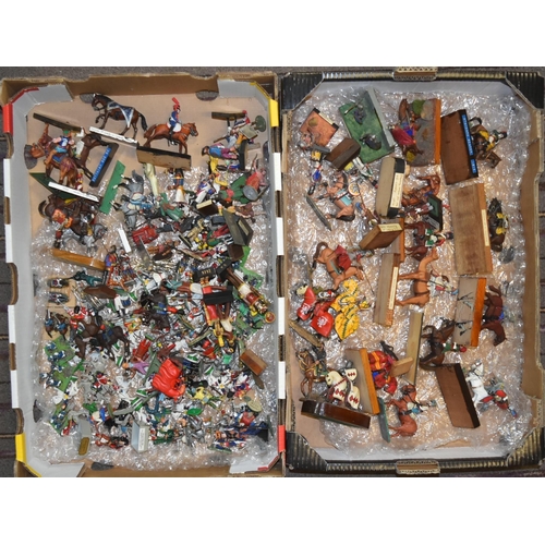 105 - A large collection of assorted vintage lead and plastic toy soldier figurines. Many horse back mount... 