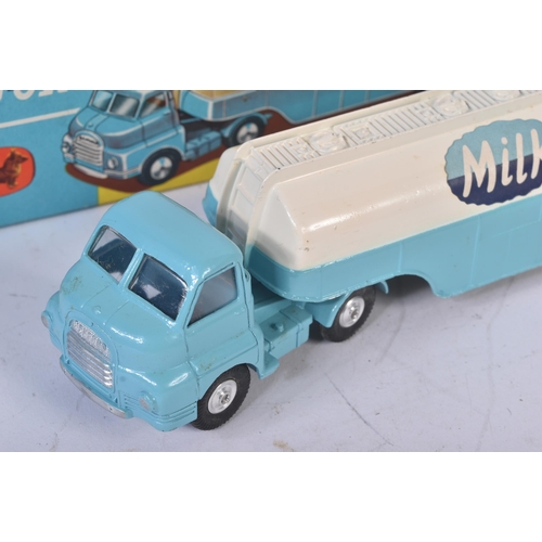 12 - An original vintage Corgi Major Toys boxed diecast model 1129 Articulated Milk Tanker. Sky blue / wh... 