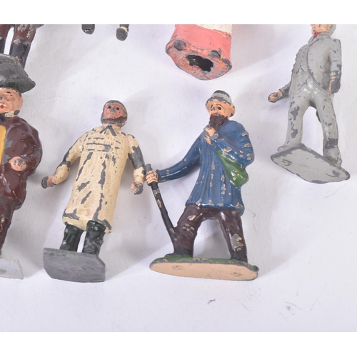 126 - A collection of vintage Britain's lead toy farm yard figurines to include; farmers / farm hands, mil... 