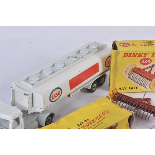 127 - A collection of assorted vintage Dinky Toys diecast models comprising; No. 945 AEC Esso Fuel Tanker ... 