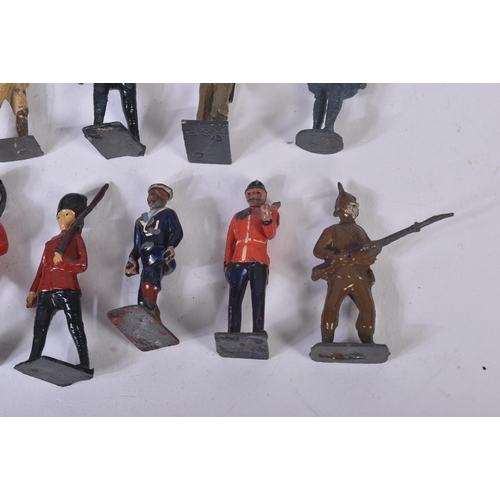 129 - A collection of approximately x40 assorted lead toy soldiers. Largely Britains made examples along w... 