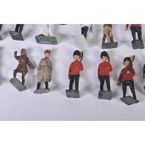 129 - A collection of approximately x40 assorted lead toy soldiers. Largely Britains made examples along w... 