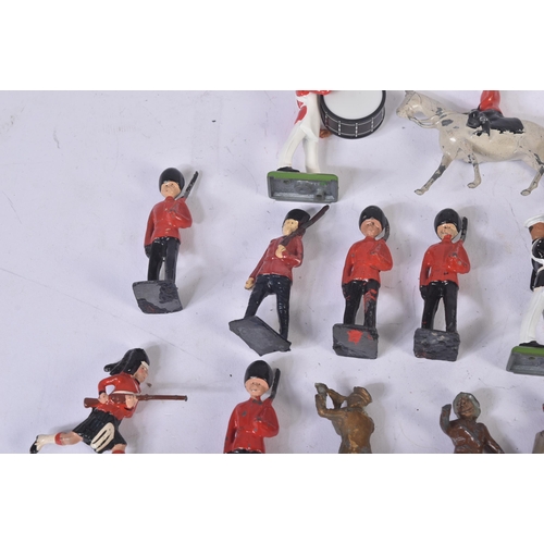 129 - A collection of approximately x40 assorted lead toy soldiers. Largely Britains made examples along w... 