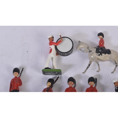 129 - A collection of approximately x40 assorted lead toy soldiers. Largely Britains made examples along w... 