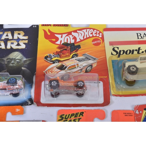 133 - A collection of assorted carded diecast model cars and other vehicles. Largely Matchbox and Hotwheel... 