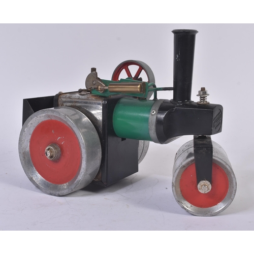 139 - An original vintage Mamod steam road roller No. SR1A / 1312. Red and green body with front roller. A... 