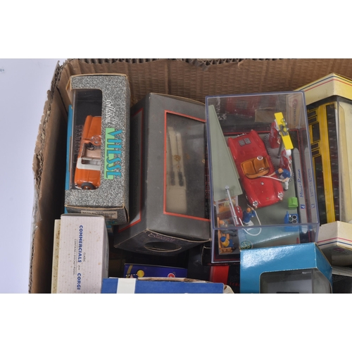 163 - A large collection of assorted boxed diecast model cars and other vehicles of various scales and mak... 