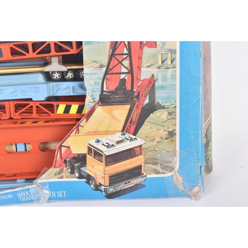 166 - A vintage Matchbox Super Kings boxed set No. K-44 Bridge Layer. The set containing a diecast cab and... 