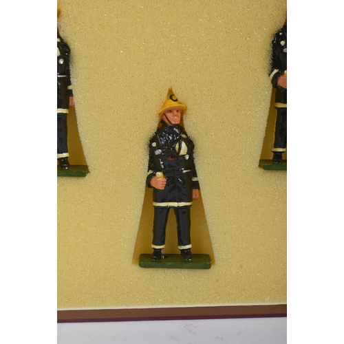 187 - A collection of vintage 1990s hand painted white metal fire fighter model figurines. The Firemen in ... 