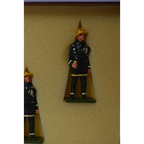 187 - A collection of vintage 1990s hand painted white metal fire fighter model figurines. The Firemen in ... 