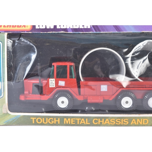 188 - Two vintage boxed diecast model trucks comprising Matchbox Super Kings  K-23 Low Loader with crank o... 