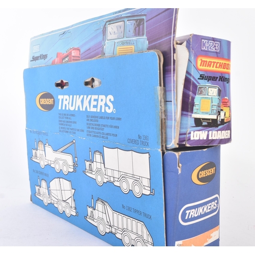 188 - Two vintage boxed diecast model trucks comprising Matchbox Super Kings  K-23 Low Loader with crank o... 