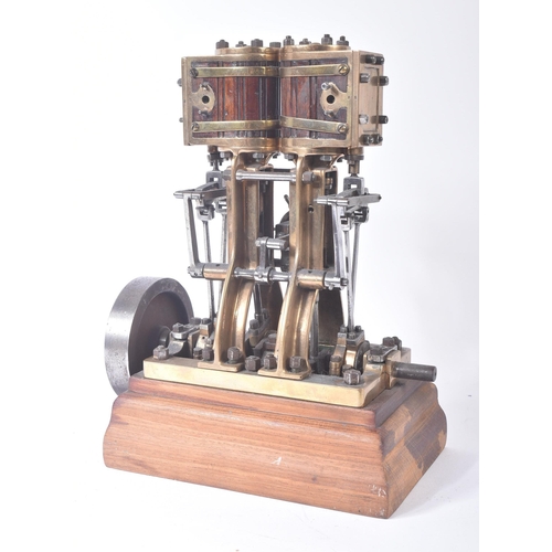 200 - Live Steam - an original vintage Stuart Turner vertical live steam engine with twin cylinders mounte... 