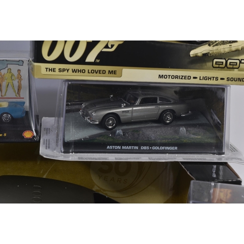 207 - A collection of assorted James Bond themed diecast of various scales and makers to include; Corgi Ro... 