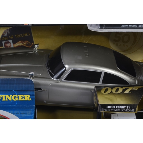 207 - A collection of assorted James Bond themed diecast of various scales and makers to include; Corgi Ro... 