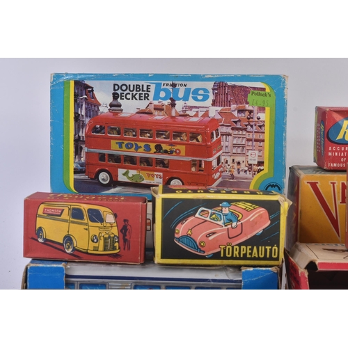 212 - A collection of assorted vintage tinplate and friction motor models. Examples to include Ambulance C... 