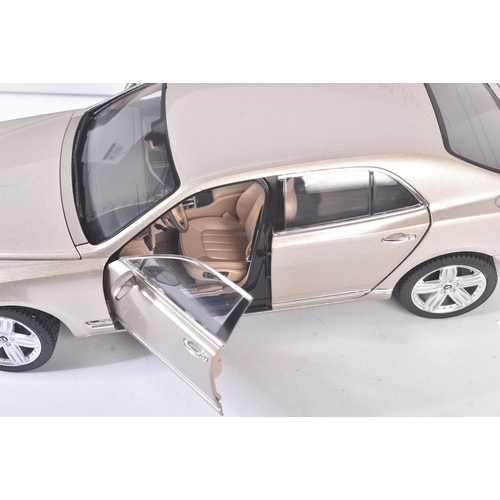 214 - An original Rastar made 1/18 scale boxed diecast model No.43800 Bentley Mulsanne in metallic beige. ... 