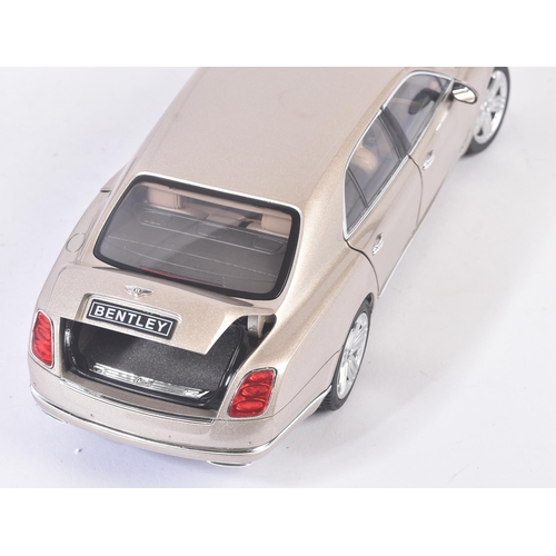 214 - An original Rastar made 1/18 scale boxed diecast model No.43800 Bentley Mulsanne in metallic beige. ... 