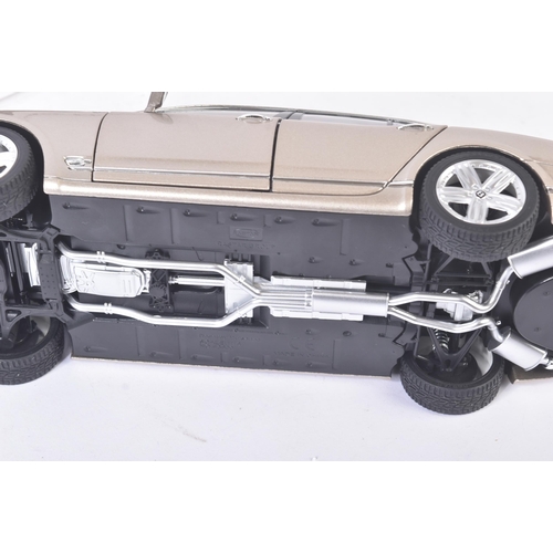 214 - An original Rastar made 1/18 scale boxed diecast model No.43800 Bentley Mulsanne in metallic beige. ... 