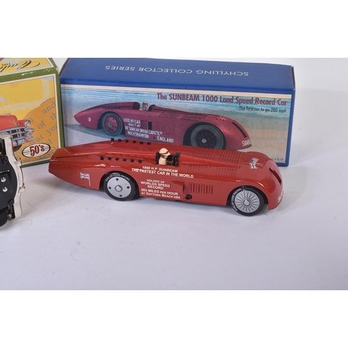 216 - Two vintage tinplate clockwork and motor friction model cars comprising a Schylling made Sunbeam 100... 