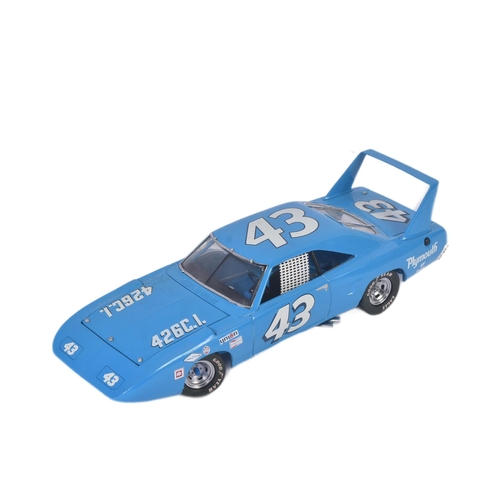 227 - An original Franklin Mint 1/24 scale diecast model Petty Plymouth Superbird car. A detailed example ... 