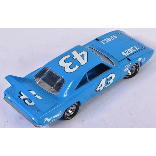 227 - An original Franklin Mint 1/24 scale diecast model Petty Plymouth Superbird car. A detailed example ... 