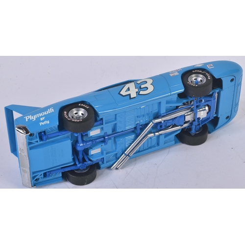 227 - An original Franklin Mint 1/24 scale diecast model Petty Plymouth Superbird car. A detailed example ... 