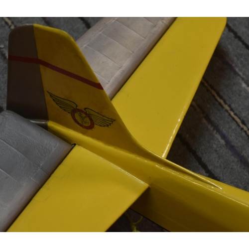 240 - Model Aeroplanes - two vintage RC Radio Controlled model aeroplanes. Including a large yellow plane,... 